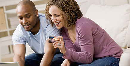 Couple using a Credit Card