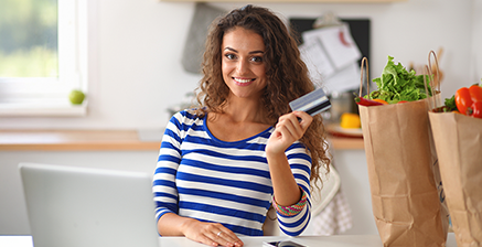 Woman holding card