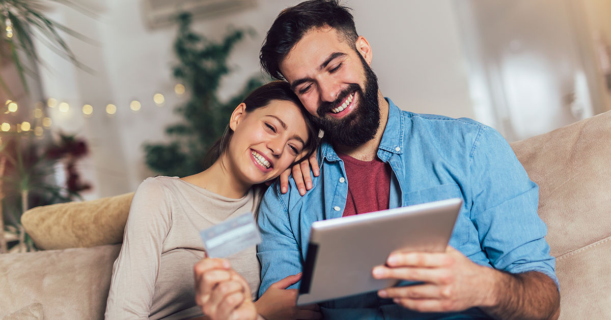 couple looking at an ipad